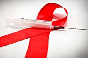 шприц и значок СПИДа